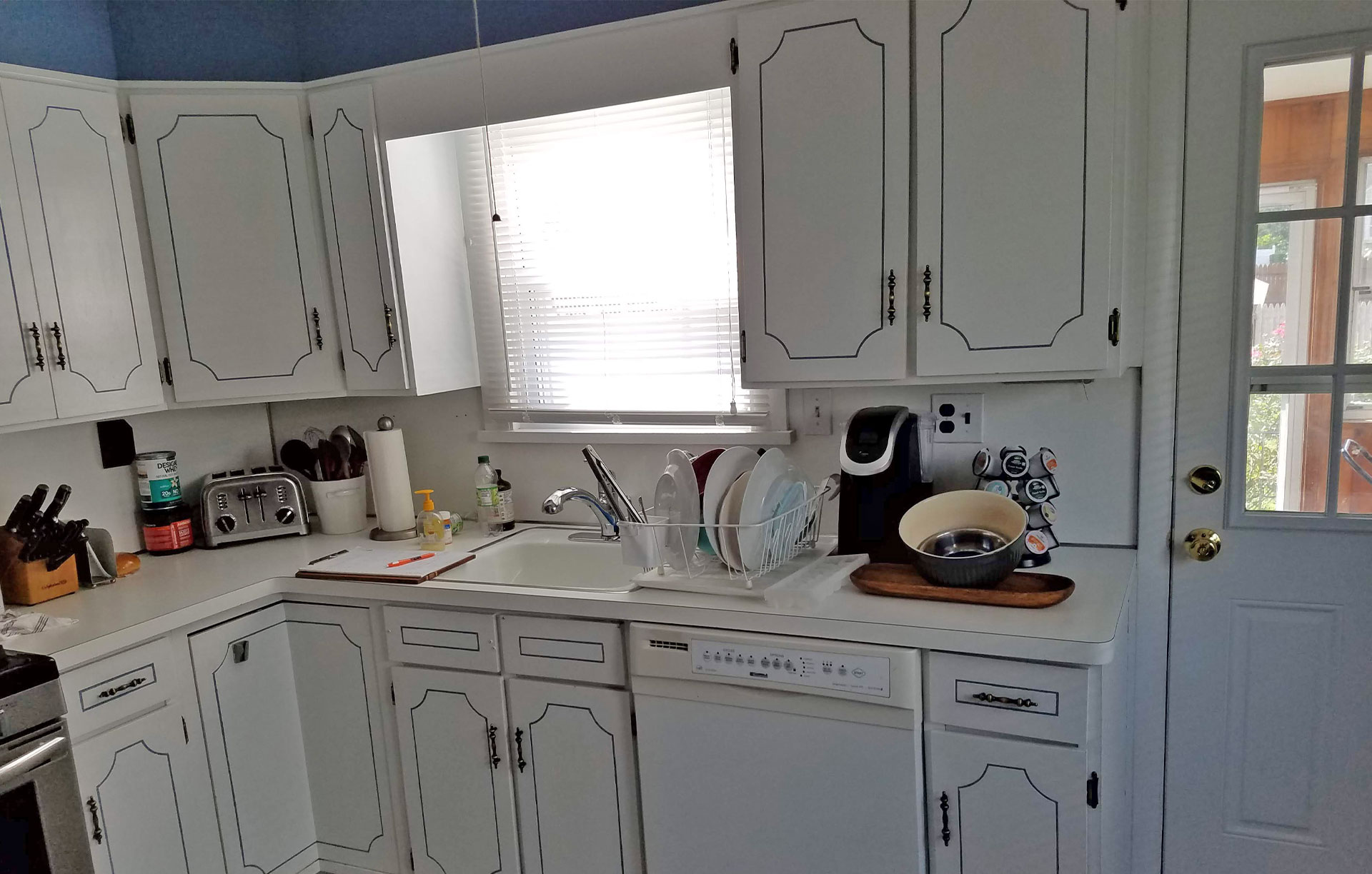 Compact Kitchen Remodel, Shaker White, Calacatta Quartz Countertops 1