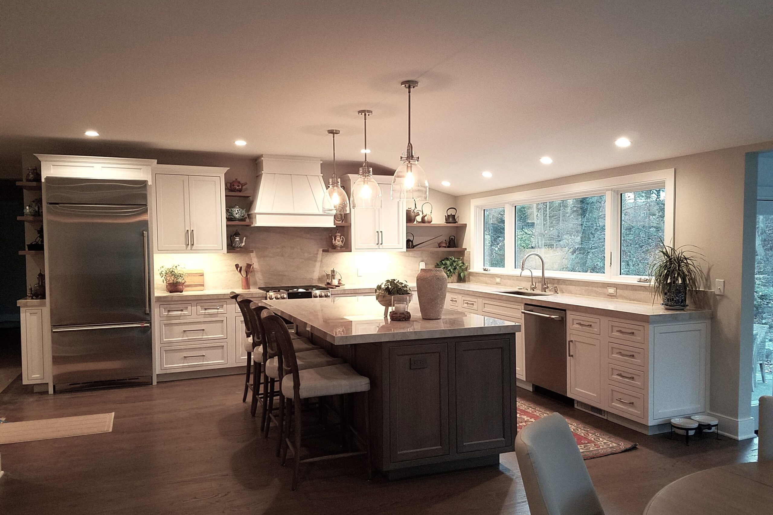 Modern kitchen with white countertops and center island
